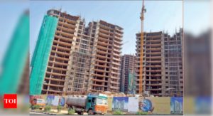 Realty sector sinks deeper into crisis this year; builders look to 2021 with hopes of demand revival - Times of India