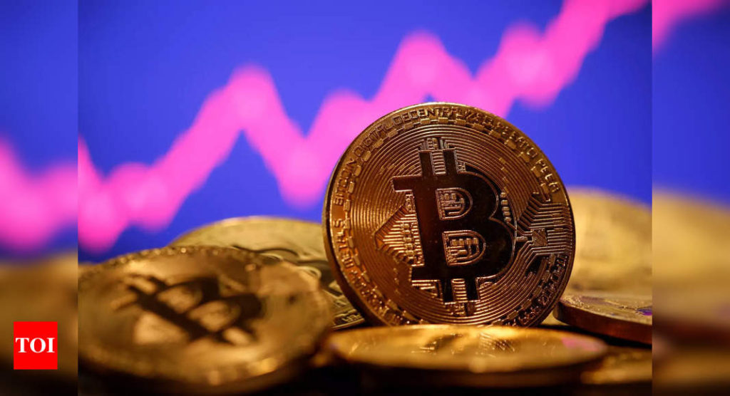 Bill to ban private cryptocurrency likely in budget session of Parliament - Times of India