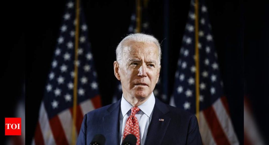 Joe Biden, citing 'economic imperative', orders faster relief checks, more food aid - Times of India