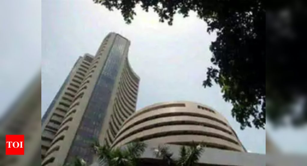 Sensex swings nearly 900 points on global cues - Times of India