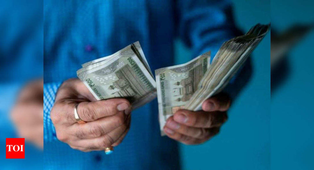 With $200 billion in extra savings, lockdown boosts household savings to 20-year high: Report - Times of India