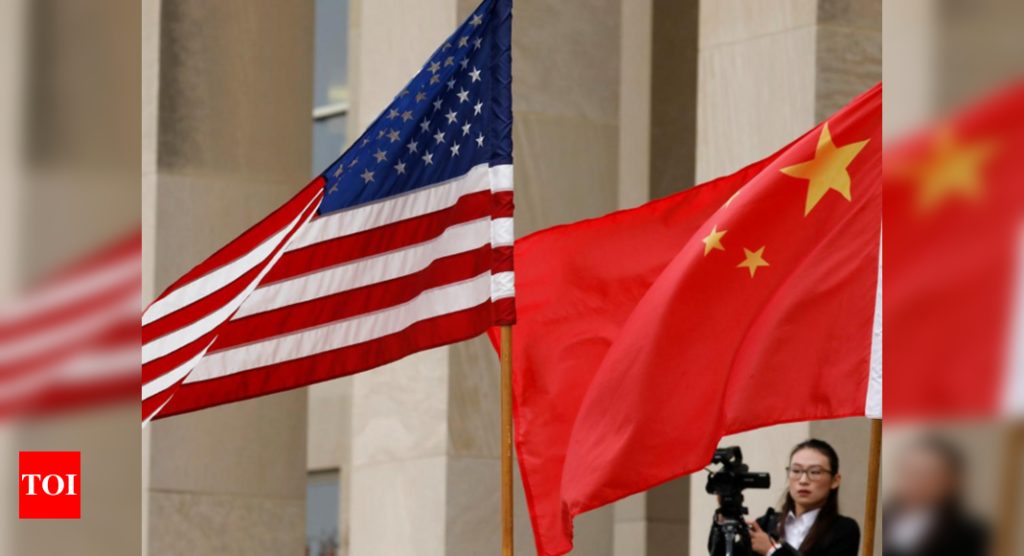 China urges US to lift trade restrictions, stop interference - Times of India