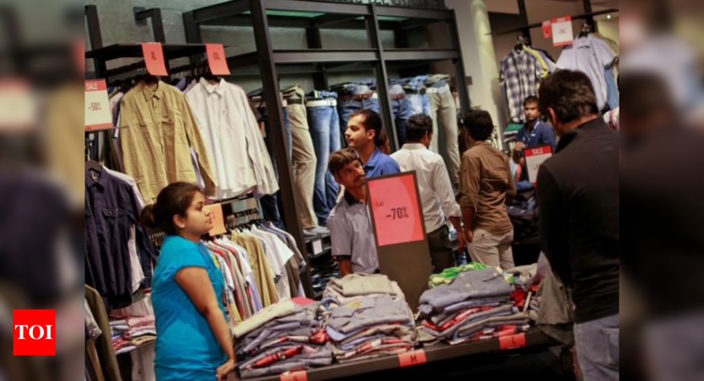 Covid's puzzling decline in India sparks a shopping spree - Times of India