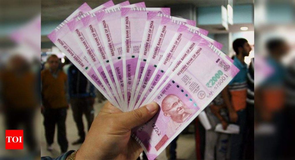 Rupee sinks 105 paise, worst fall since March - Times of India