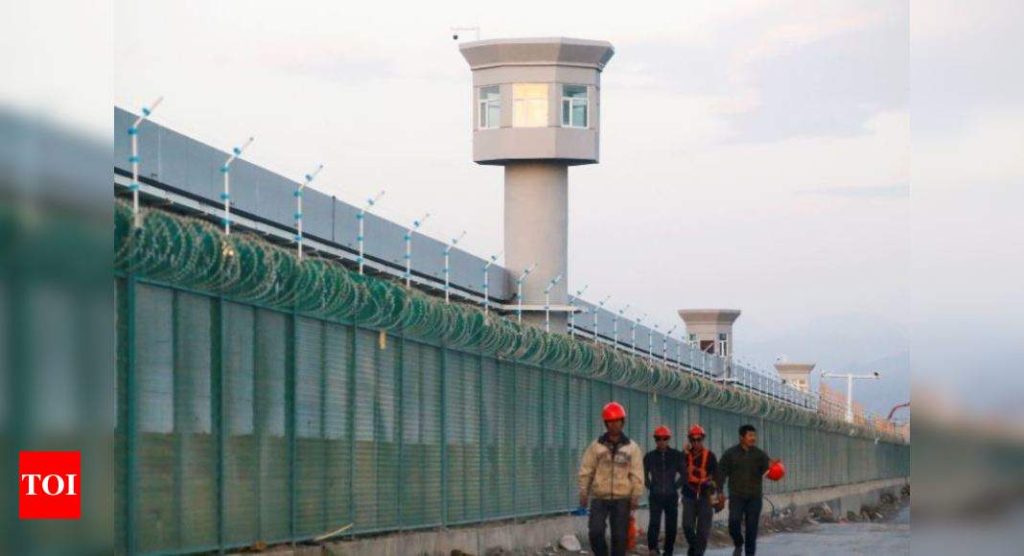 China warns companies against politicising actions regarding Xinjiang - Times of India