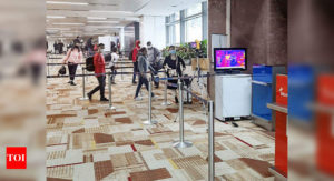 Consider imposing fines on passengers for not wearing masks properly: DGCA to airports - Times of India