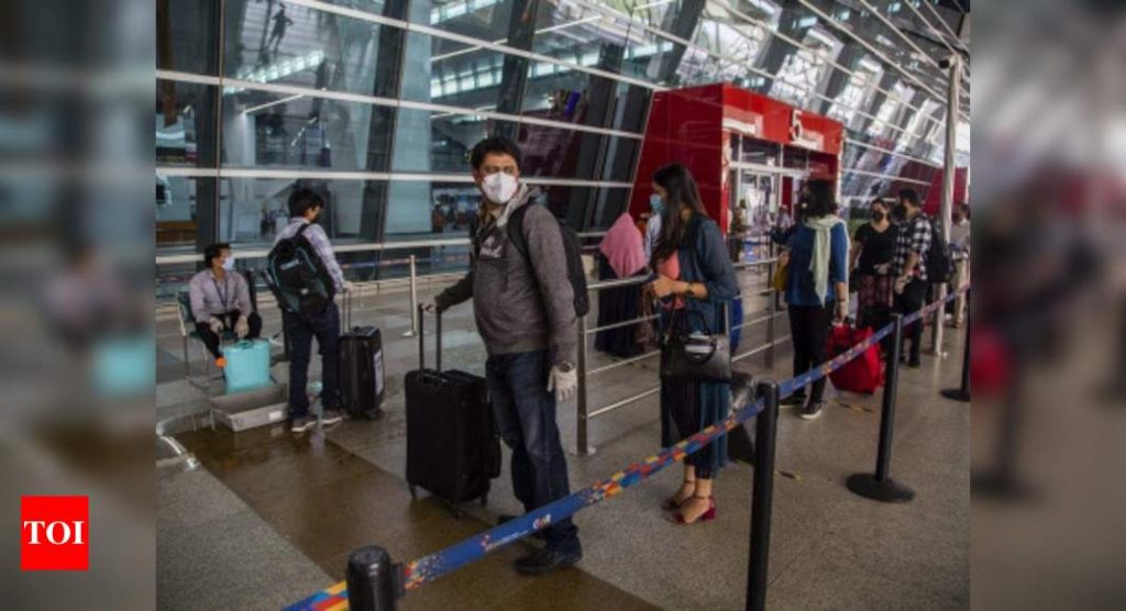 First case: Four flyers handed over to cops for not wearing mask on flight - Times of India