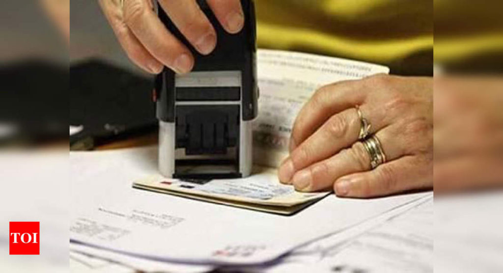 OCI card holders no longer required to carry old passports for India travel; diaspora welcomes move - Times of India