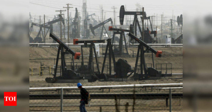 Oil flirting with $70 challenges world’s economic recovery - Times of India