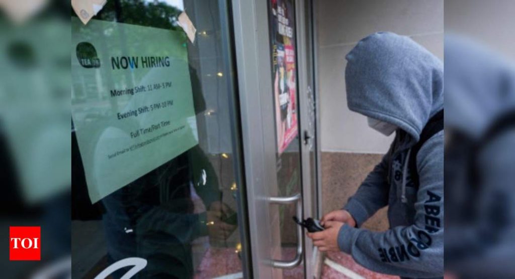 US weekly jobless claims hit one-year low in boost to economic outlook - Times of India