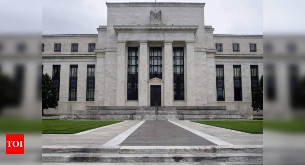 Fed holds rates at zero, sees 2 hikes by 2023-end - Times of India