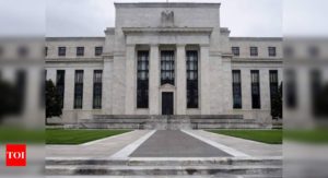 Fed holds rates at zero, sees 2 hikes by 2023-end - Times of India