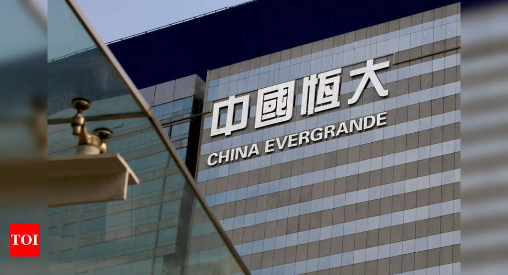 Evergrande founder offers staff assurances: Report - Times of India