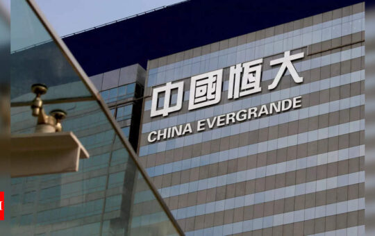 Evergrande founder offers staff assurances: Report - Times of India