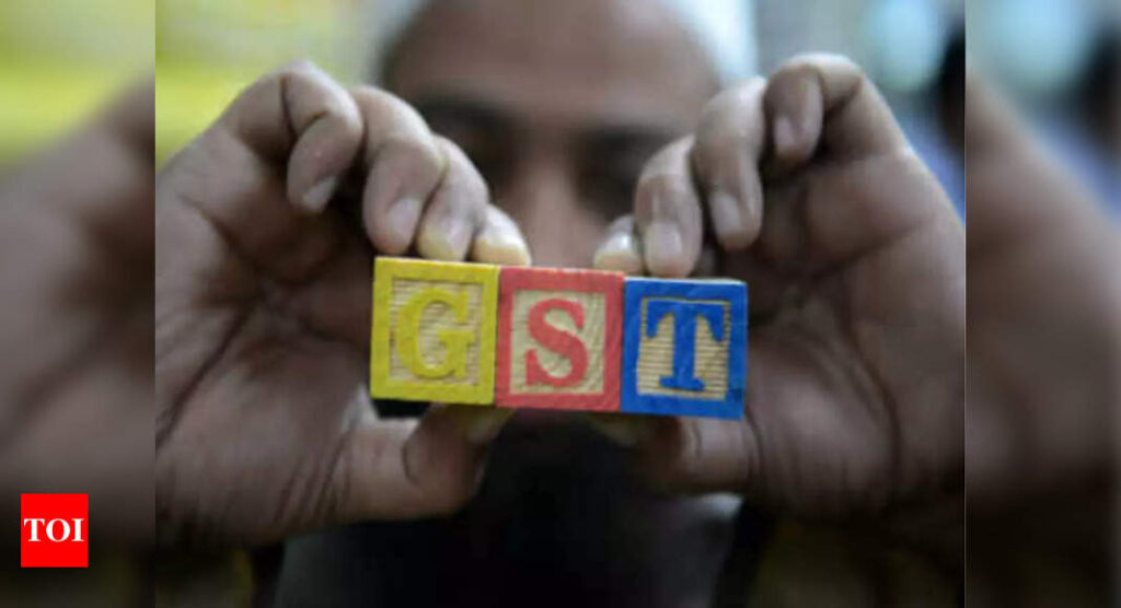 GST kitty dips 4%, stays above Rs 1 lakh crore - Times of India