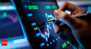 Get your shares next day, not after 2 days - Times of India