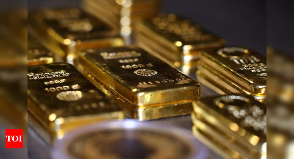 Gold climbs as slower US jobs growth clouds Fed taper timeline - Times of India