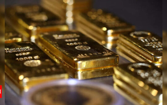 Gold climbs as slower US jobs growth clouds Fed taper timeline - Times of India