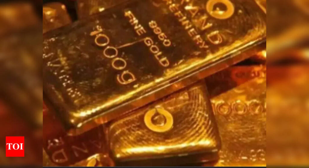 Gold inches higher; set for weekly loss as dollar holds firm - Times of India