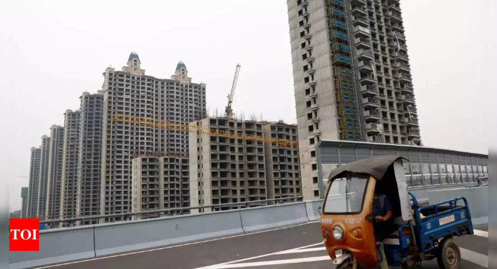 evergrande: Evergrande wooed retail investors with Gucci bags and Dyson appliances - Times of India