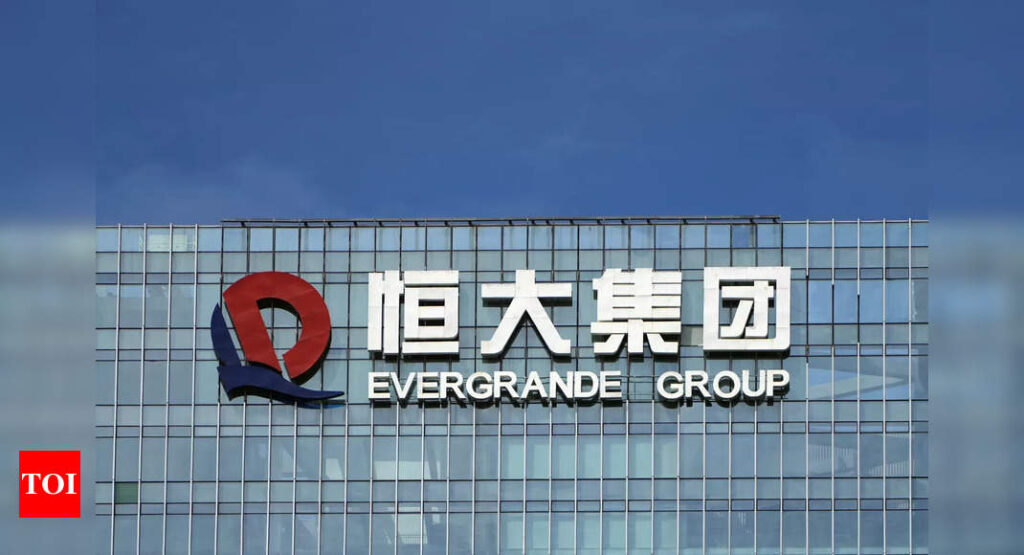 fis astec: Cost of borrowing Evergrande stock hits new high on debt fears - Times of India