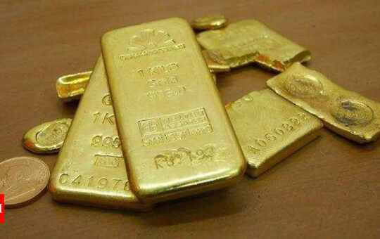 Gold Price Today: Gold hits 1-month high as dollar weakens, set for weekly gain | India Business News - Times of India