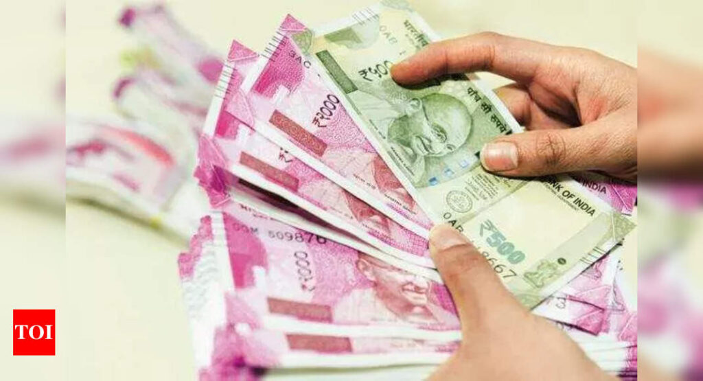 Rupee hits record low of 77.82 against US dollar in early trade - Times of India