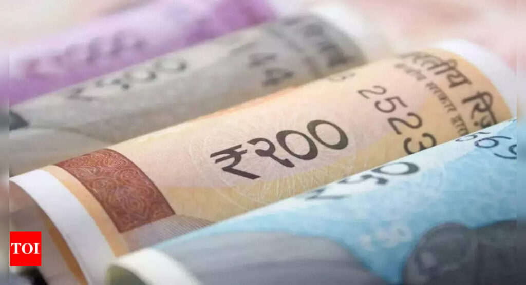 Rupee recovers from record low, inches higher by 9 paise against US dollar in early trade - Times of India