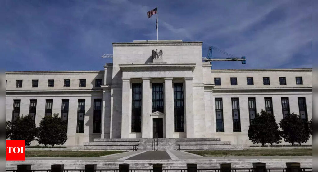 US Federal Reserve hikes rates by 75 bps, flags slowing economy - Times of India