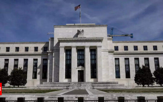 US Federal Reserve hikes rates by 75 bps, flags slowing economy - Times of India