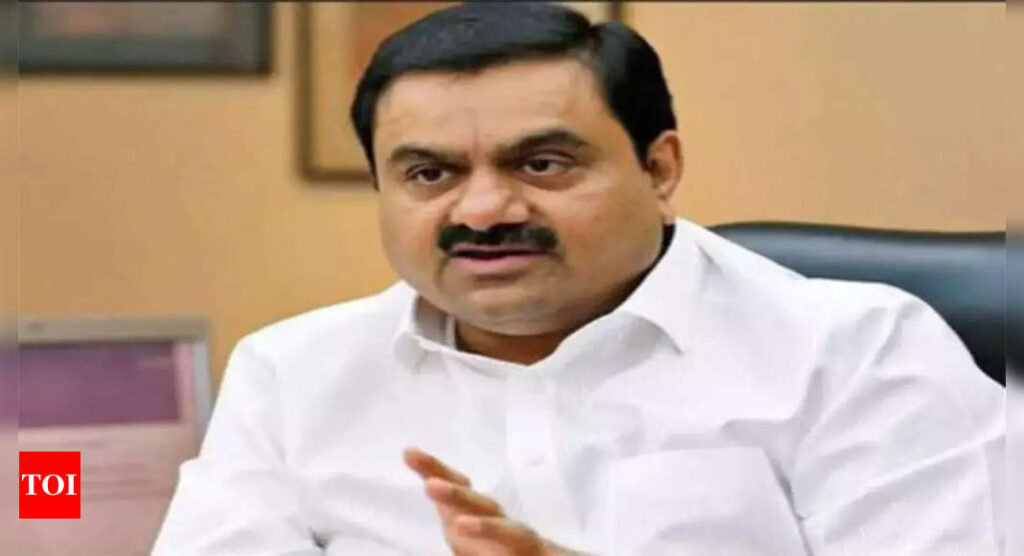 Adani says never slowed investments; $70 billion to turn India to clean energy exporter - Times of India