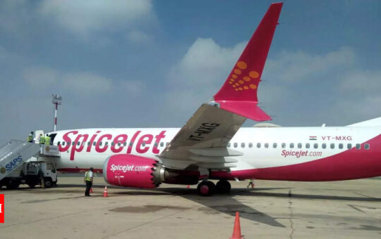 DGCA orders SpiceJet to operate 50% of approved flights for 8 weeks - Times of India