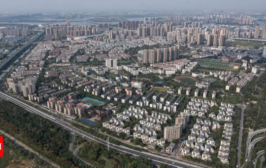 More Chinese homebuyers refuse to pay loans amid contagion fears - Times of India