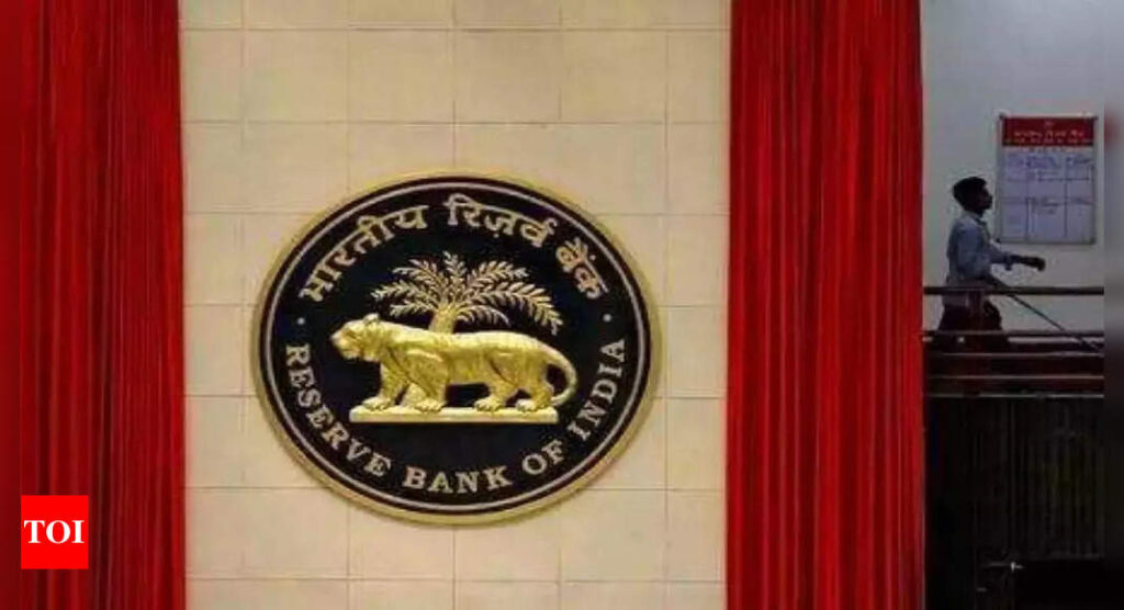 RBI takes steps to attract dollar in bid to check rupee's slide - Times of India