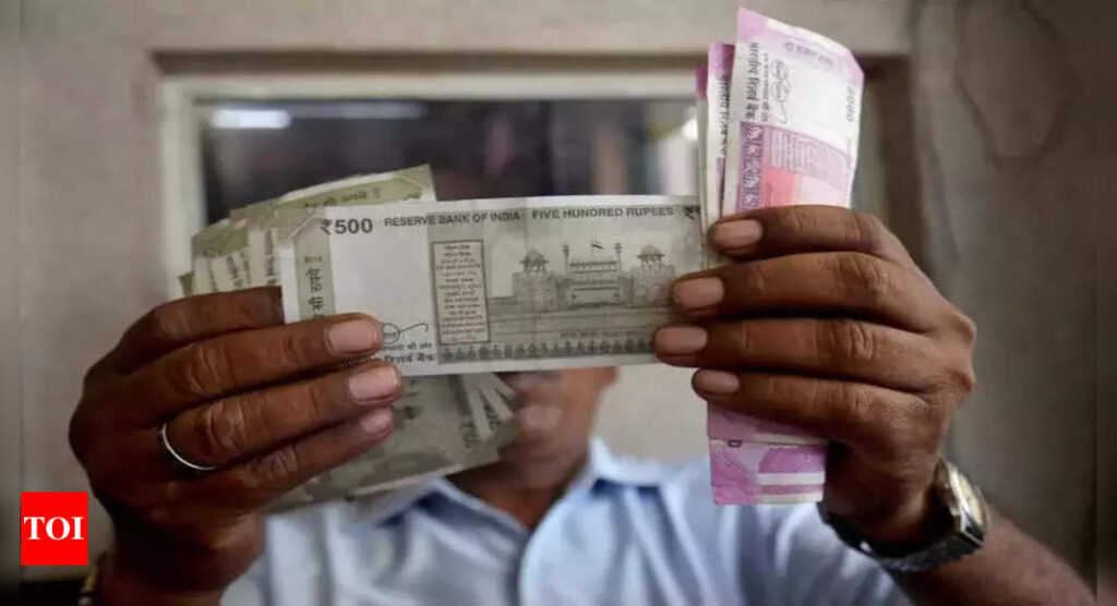 Rupee down 15 paise to all-time low of 79.60 against US dollar - Times of India