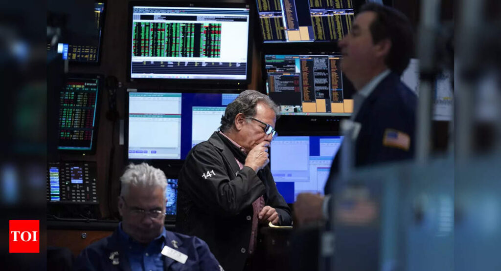 Wall Street ends tumultuous week with strong rally as rate hike fears wane - Times of India