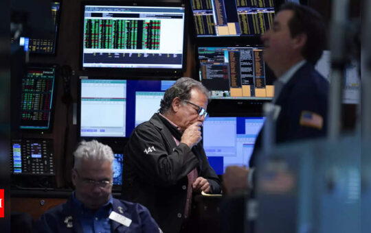 Wall Street ends tumultuous week with strong rally as rate hike fears wane - Times of India