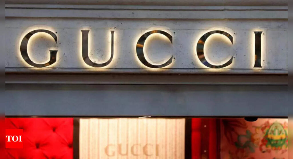 Gucci becomes first major brand to accept crypto coin as payment - Times of India