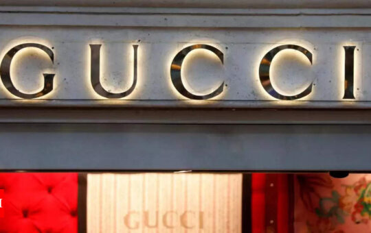 Gucci becomes first major brand to accept crypto coin as payment - Times of India
