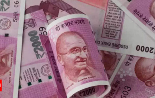 Rupee breaches 80 vs dollar again on hawkish US Fed tone - Times of India